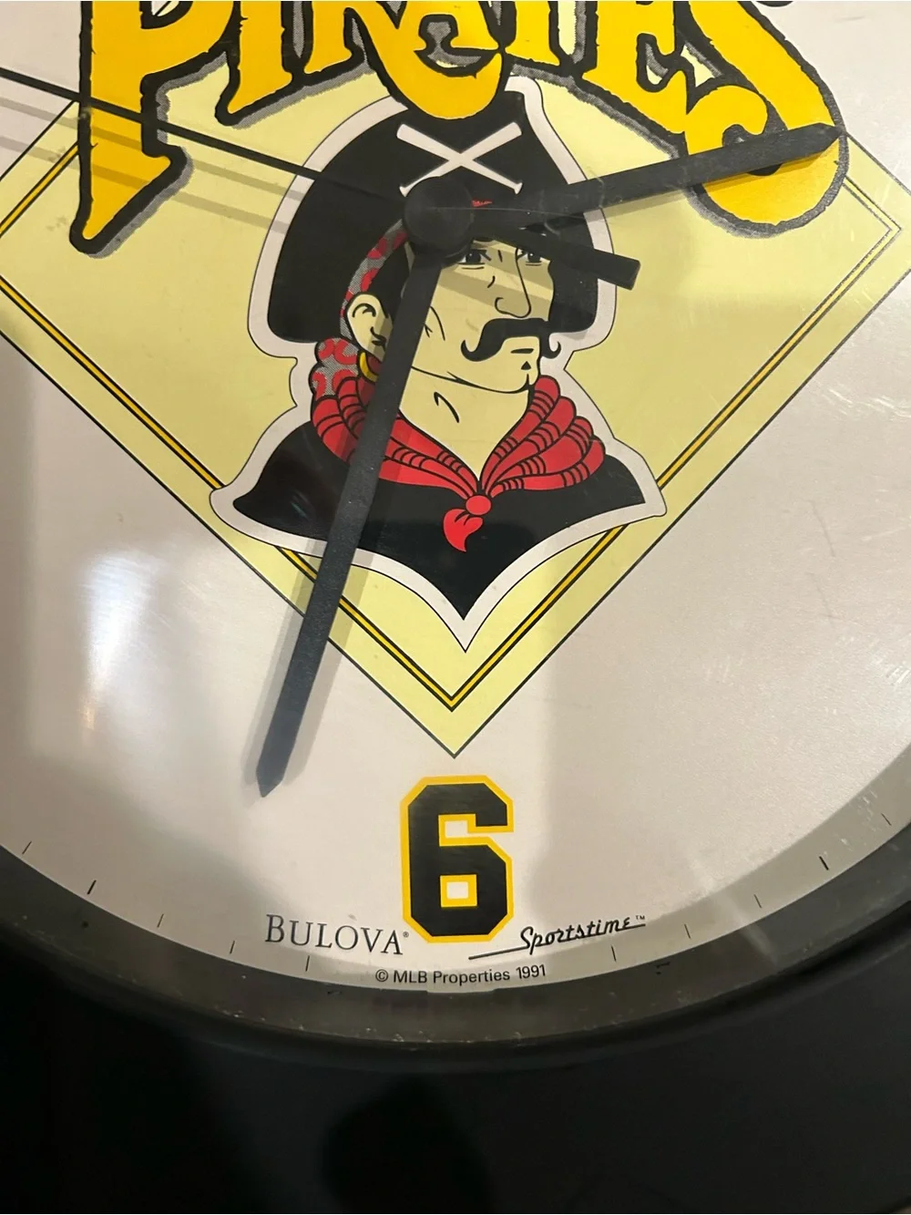 Bulova Pirates Wall Clock - Black and Yellow with Red Accent